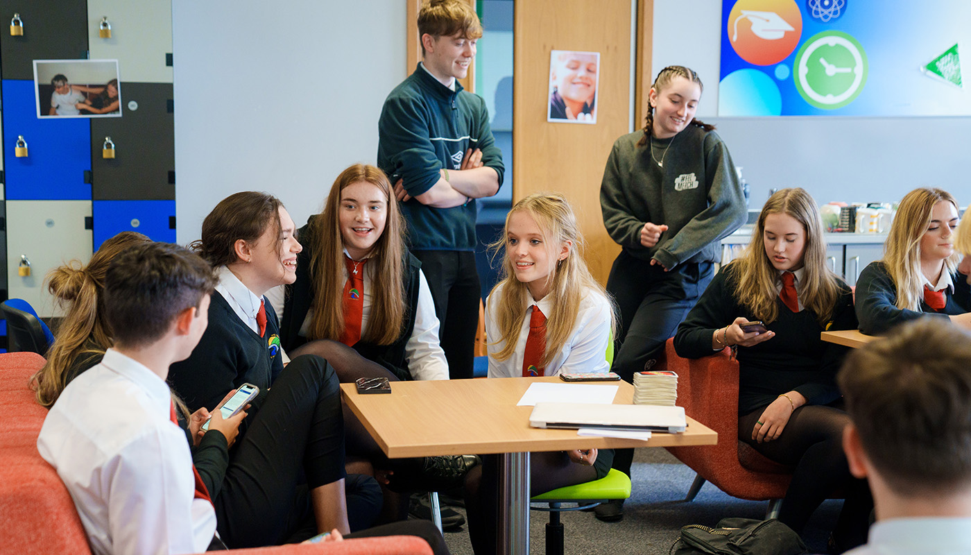 Pupils sitting around a table