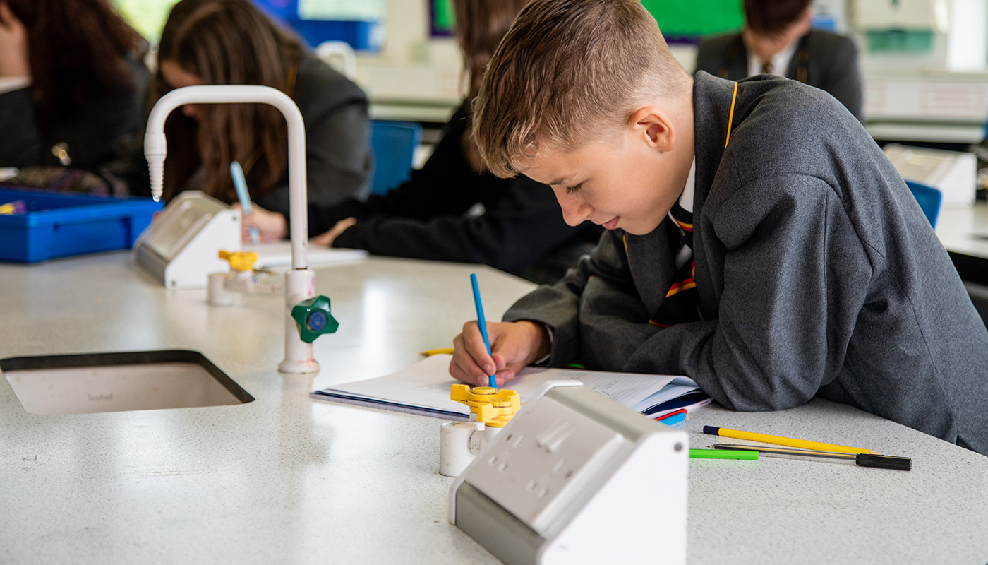 School pupils studying in a classroom